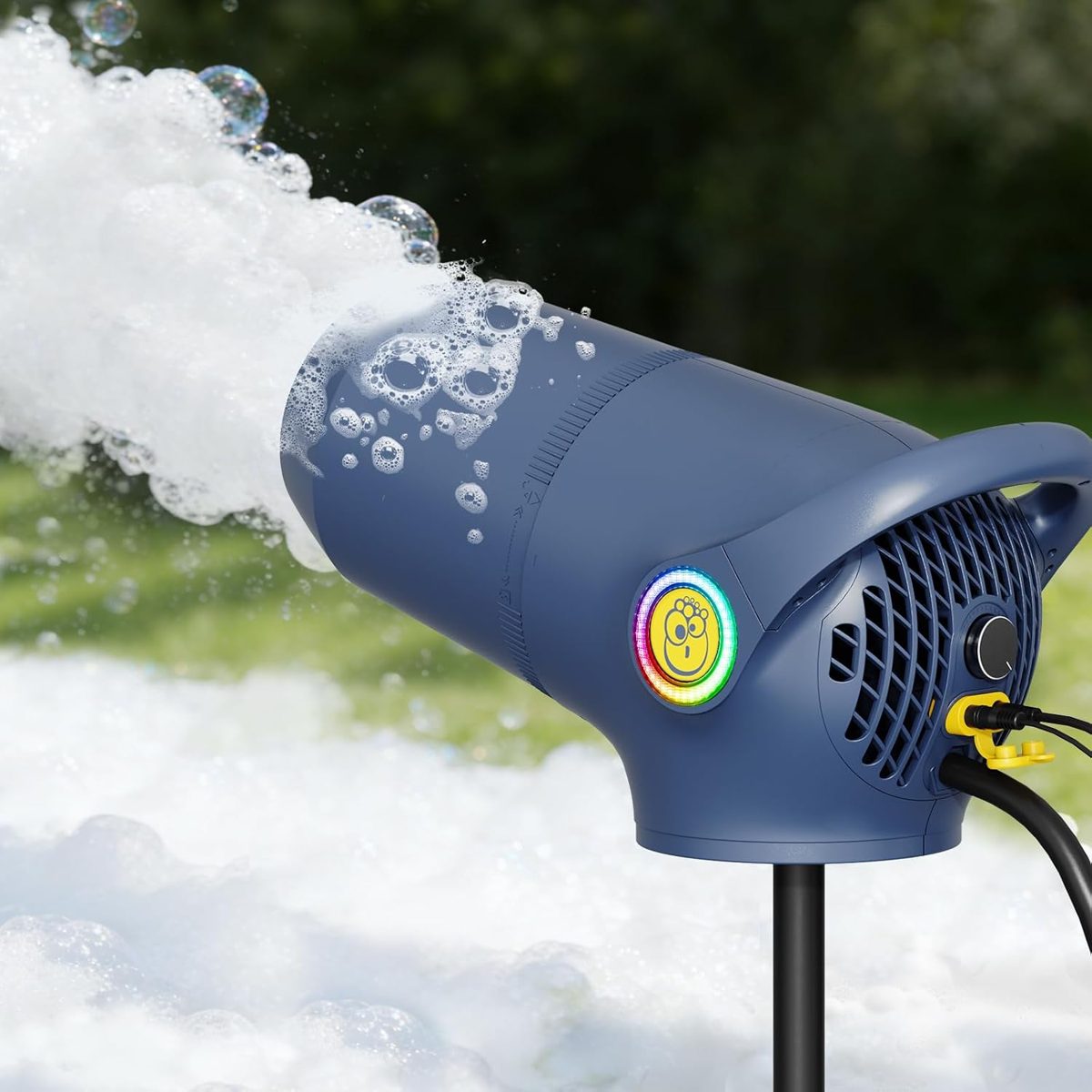 Foam cannon shooting a stream of foam and bubbles outdoors